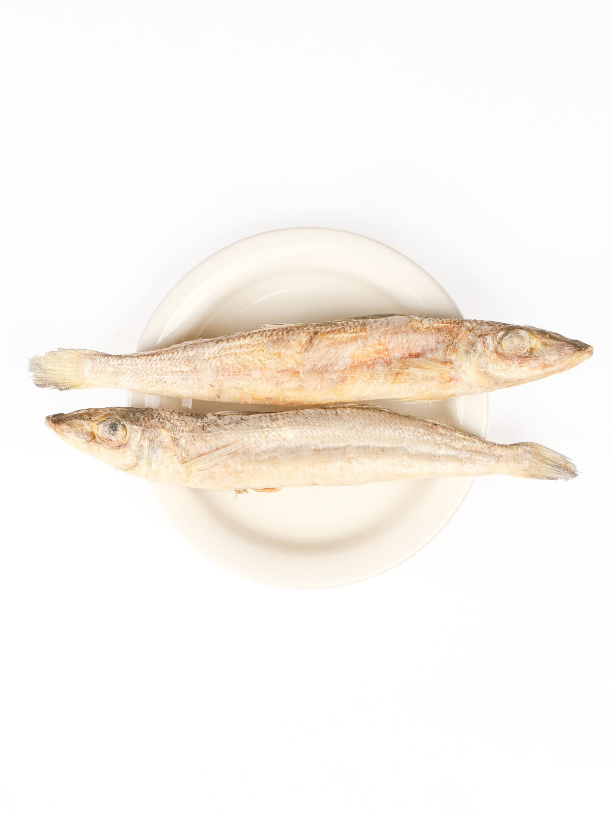 Gefriergetrockneter Sandaal – ganze Fische als Topping